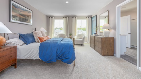 primary bedroom with carpet
