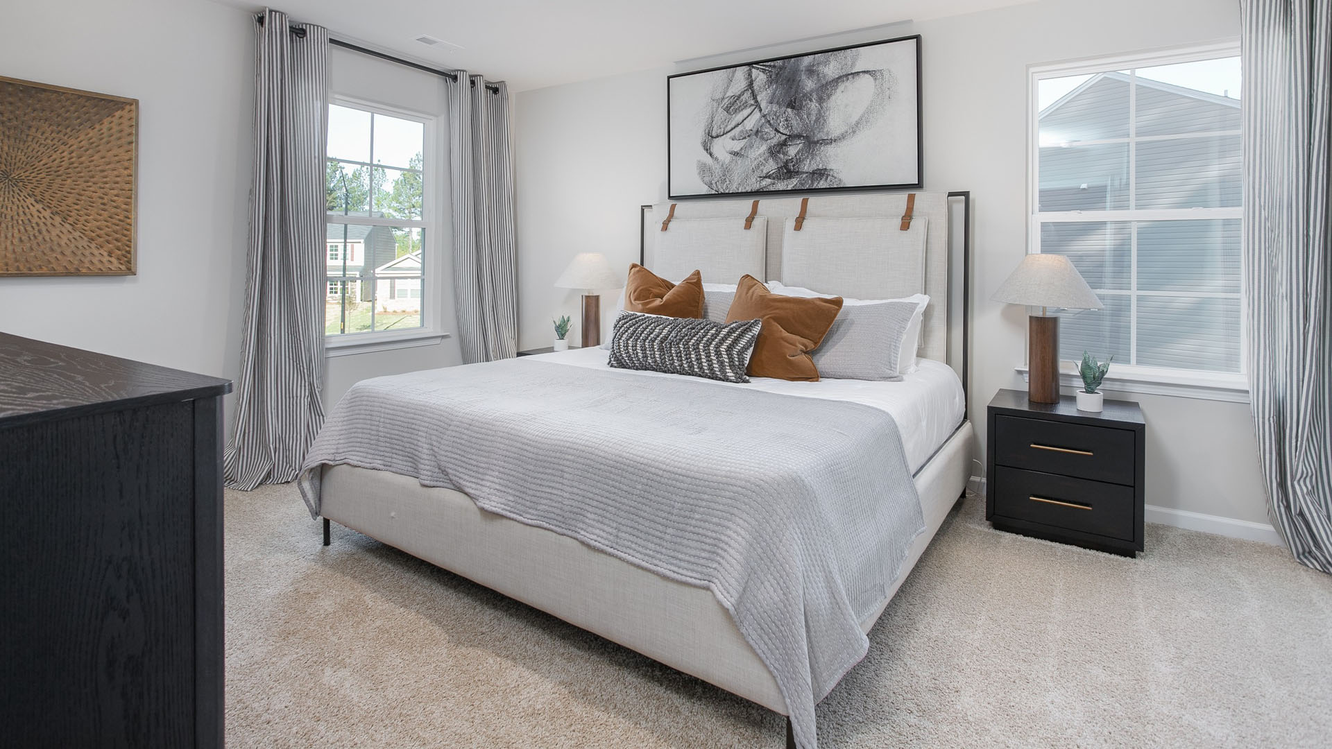 bedroom with carpet and natural light