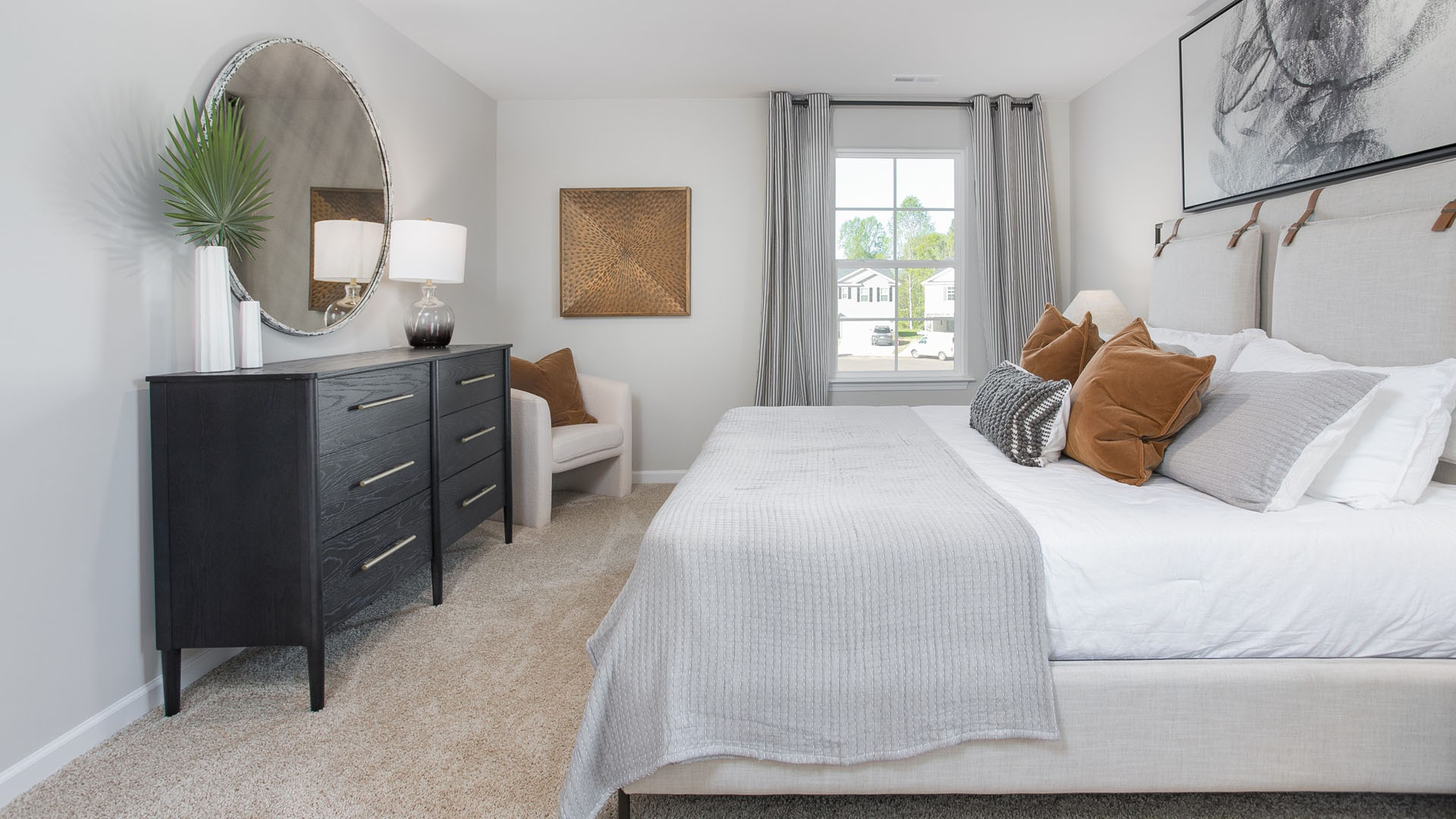 bedroom with carpet and natural light