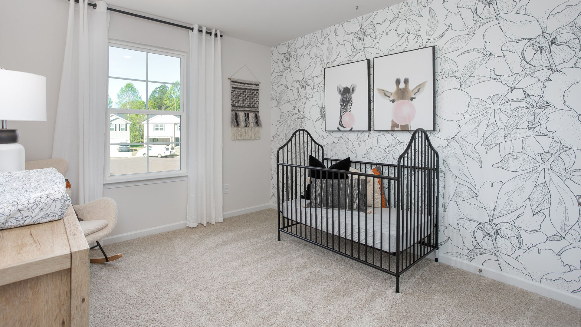 bedroom with carpet and natural light