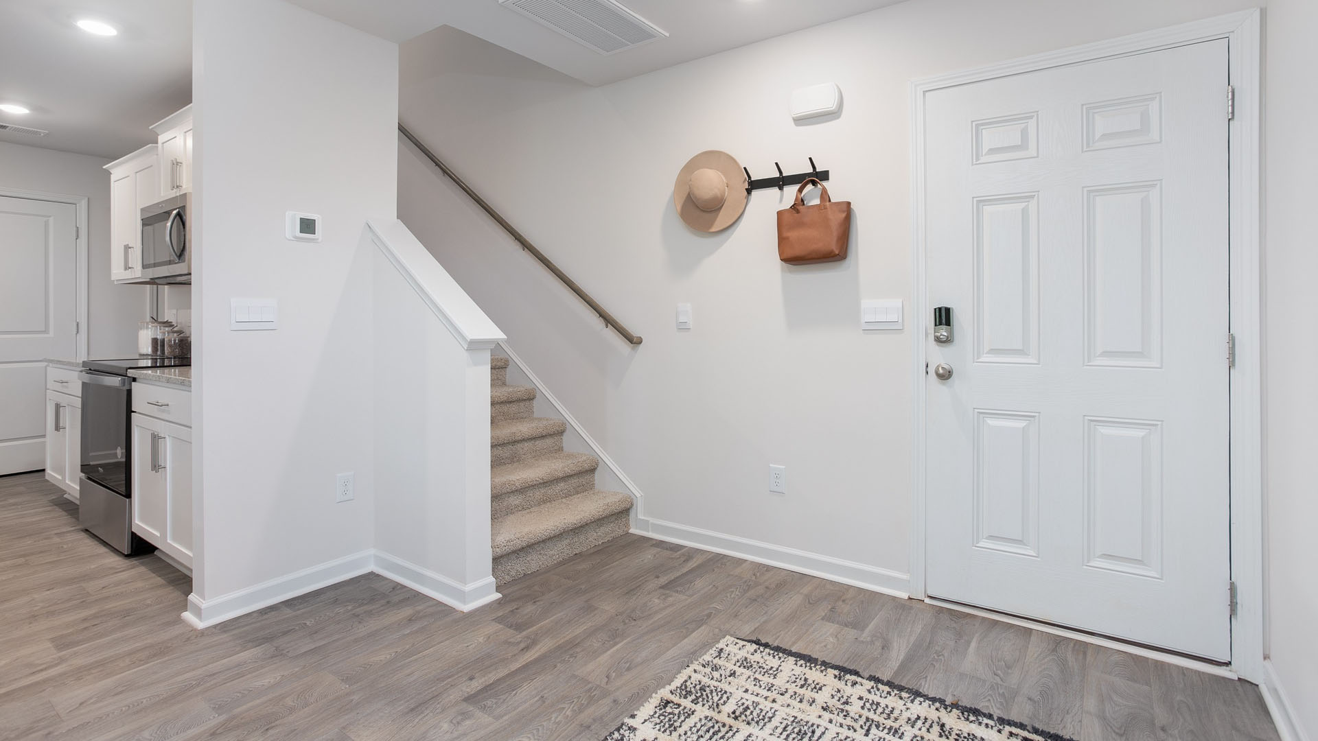 front door with vinyl floor