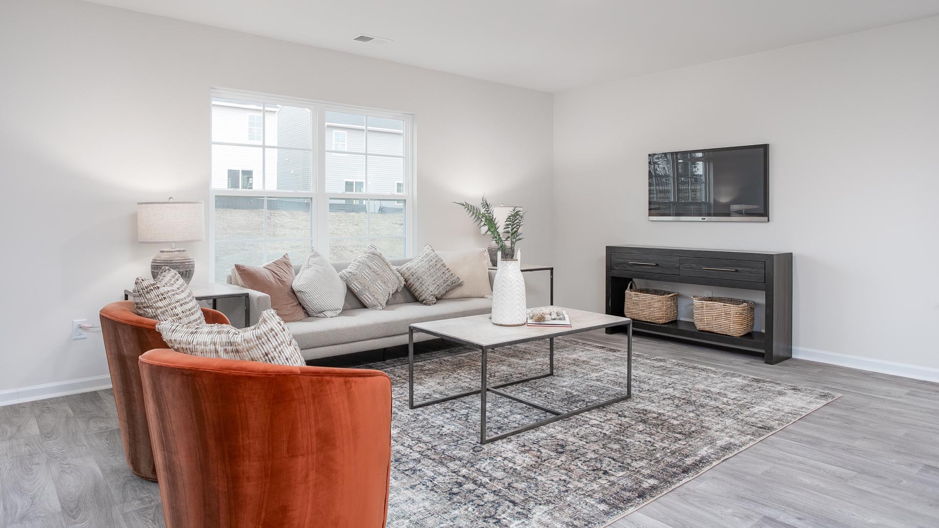 living room with vinyl floor and natural light