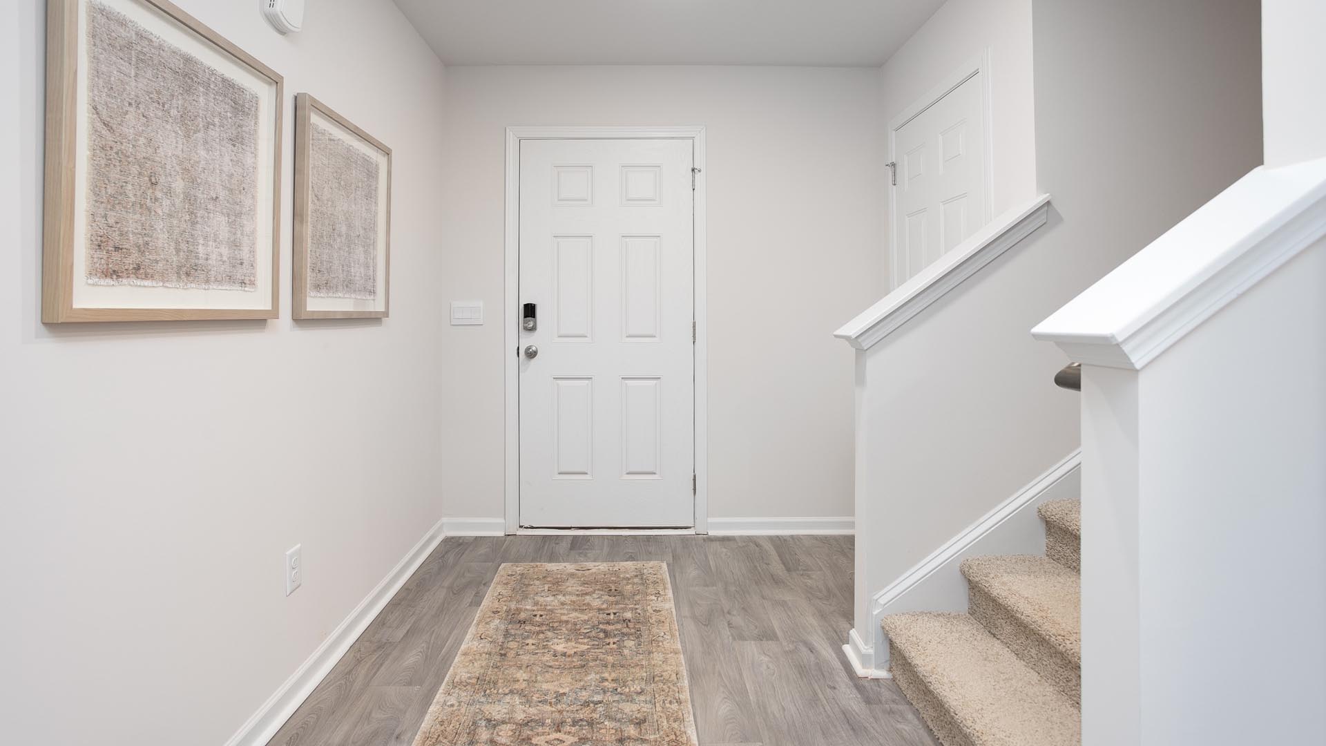 front door with vinyl flooring