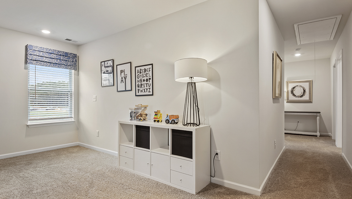 Loft with carpet and natrual light