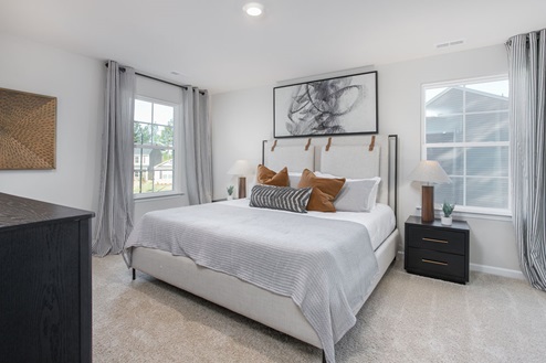 bedroom with carpet and natural light