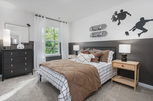 bedroom with carpet and natural light
