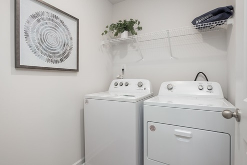 laundry room with shelfs
