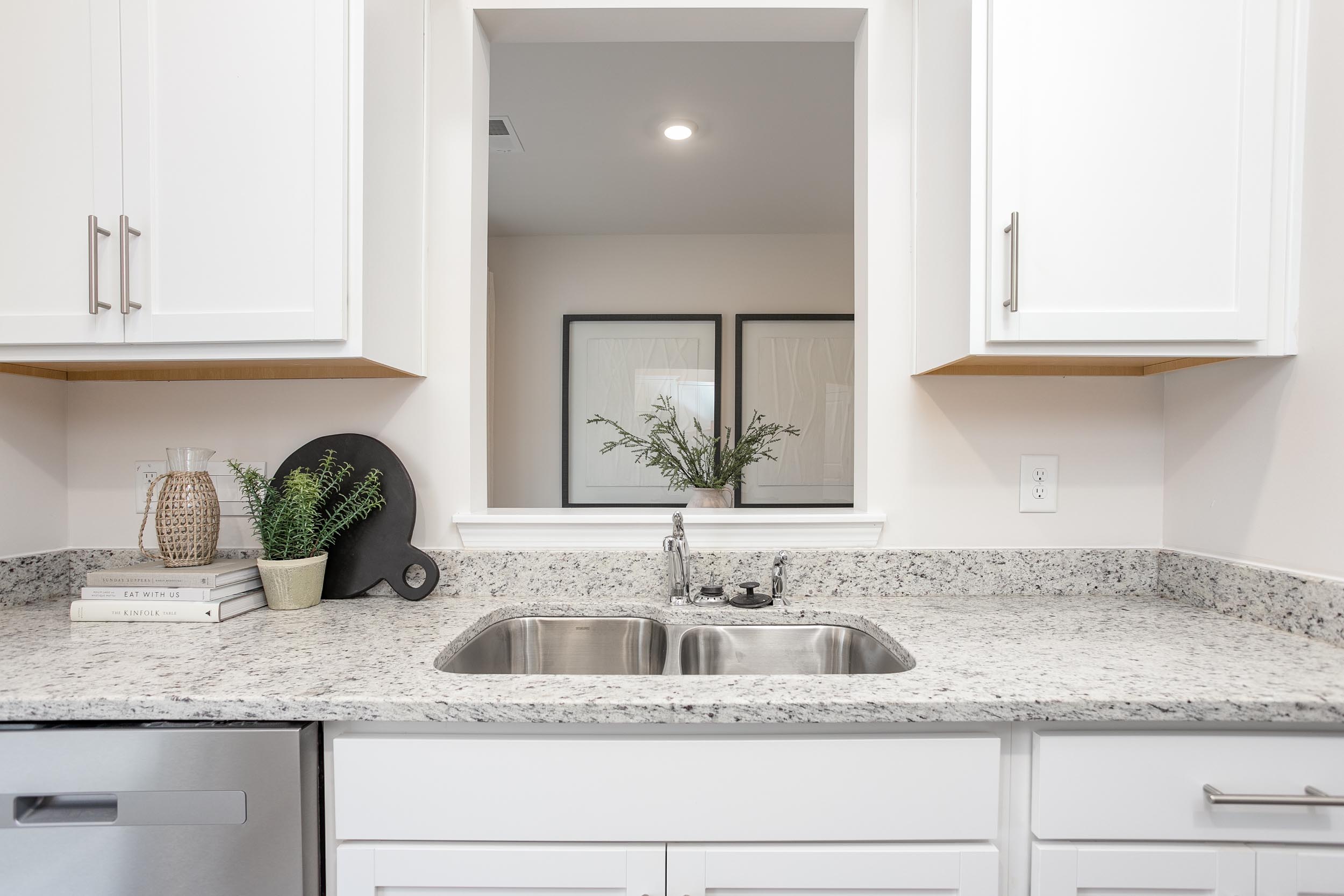 kitchen with vinyl floor and stainless steel appliances