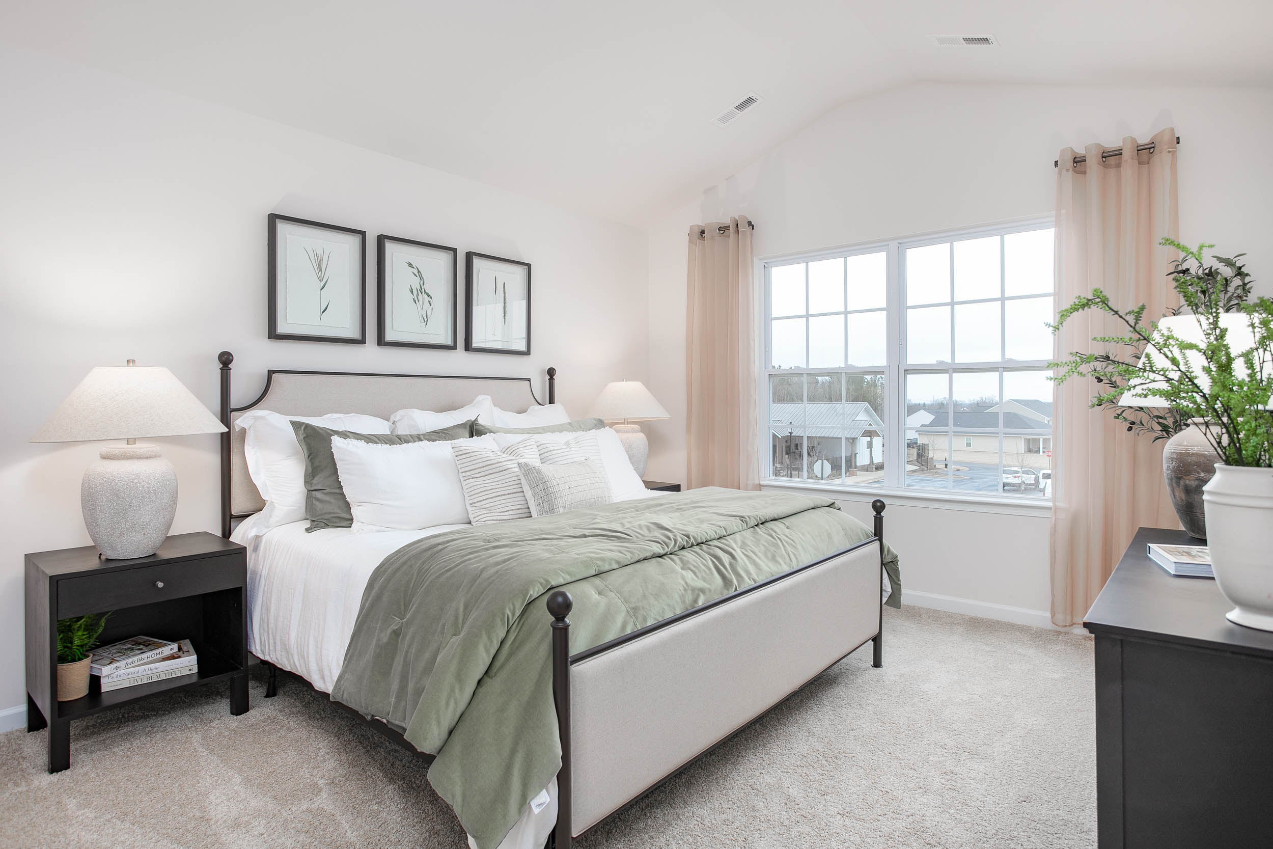 bedroom with carpet and natural light