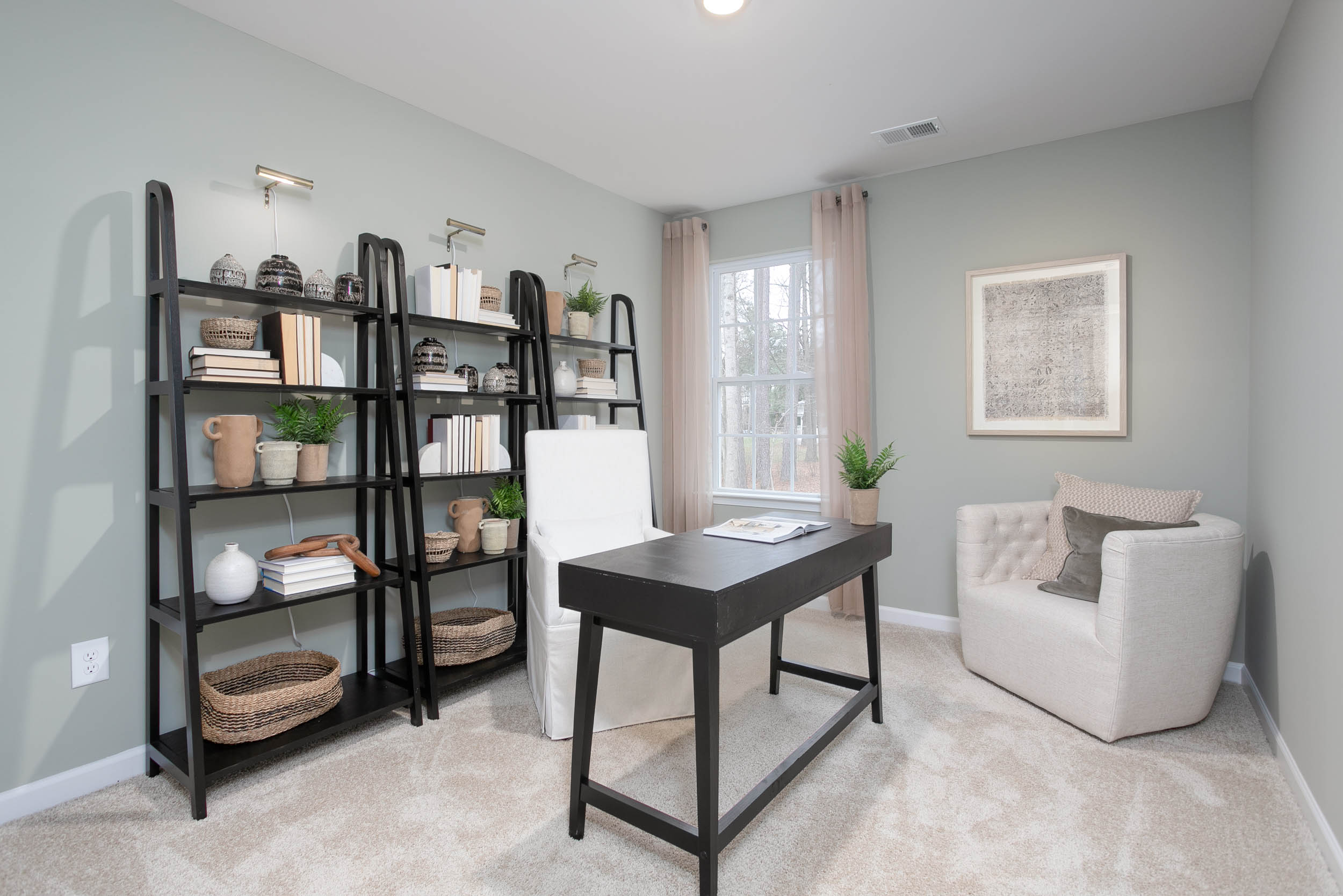 Office with carpet and natural light