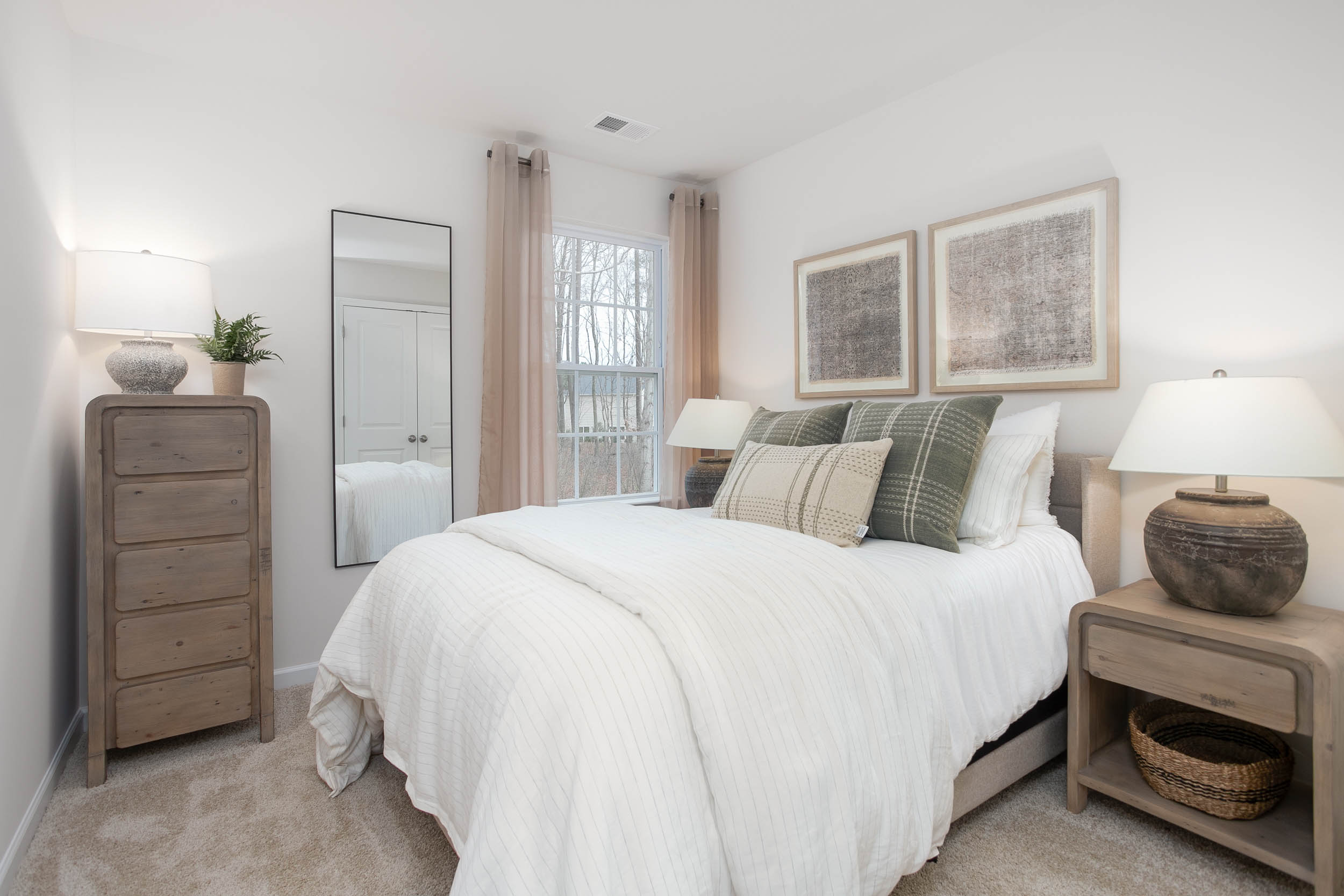 bedroom with carpet and natural light