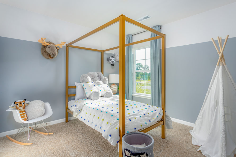 bedroom with carpet and natural light