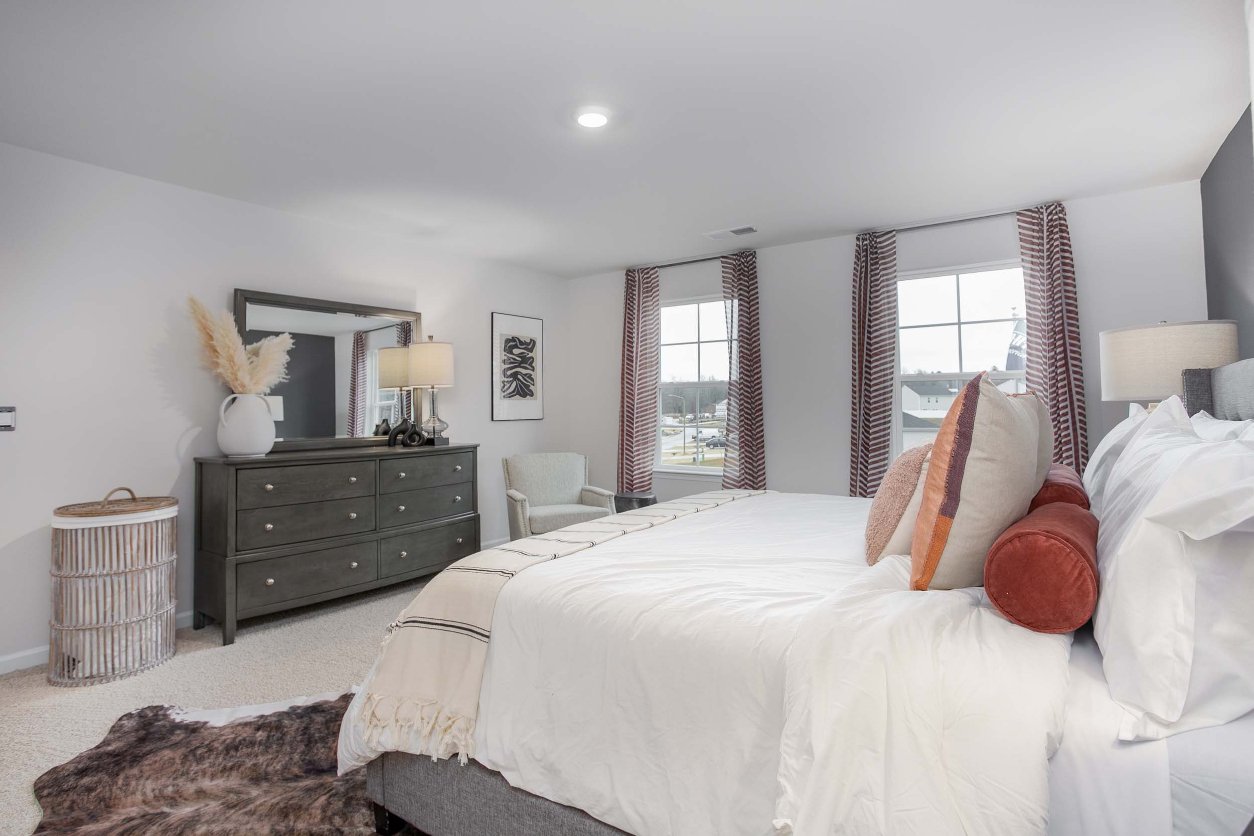 bedroom with carpet and natural light