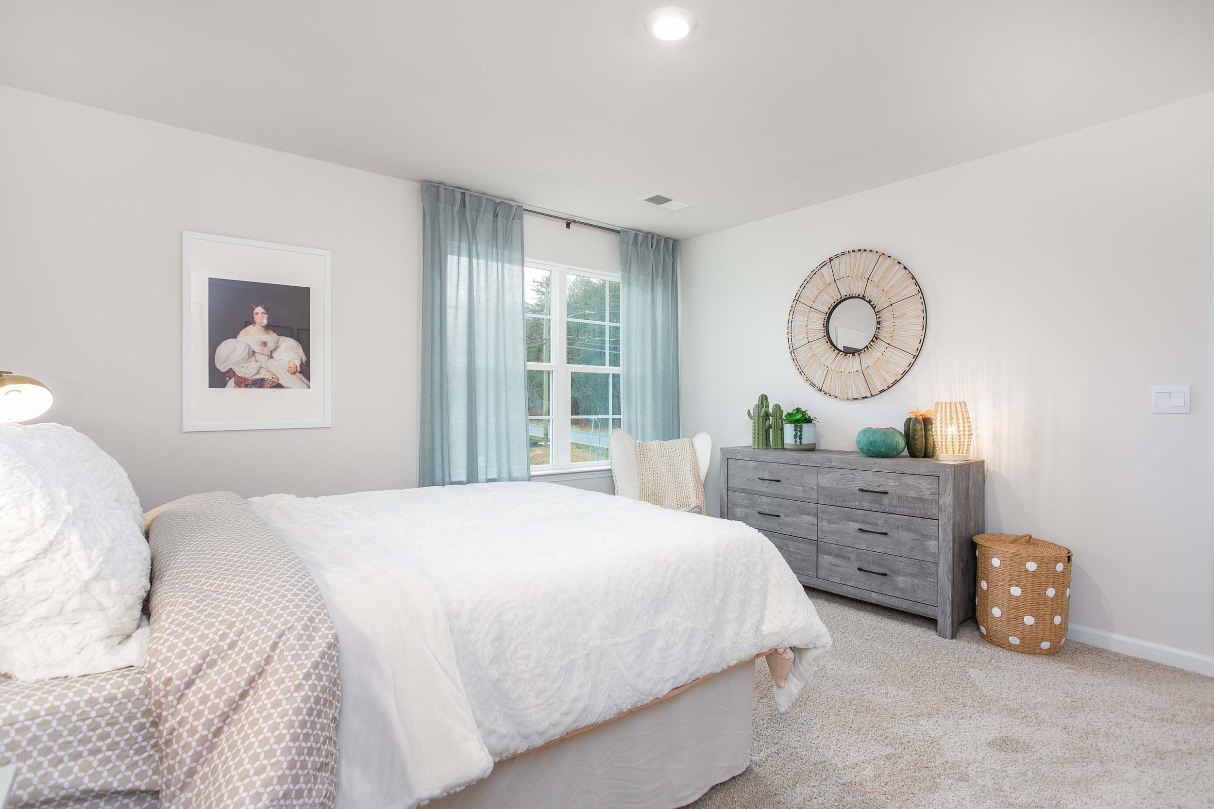 bedroom with carpet and natural light