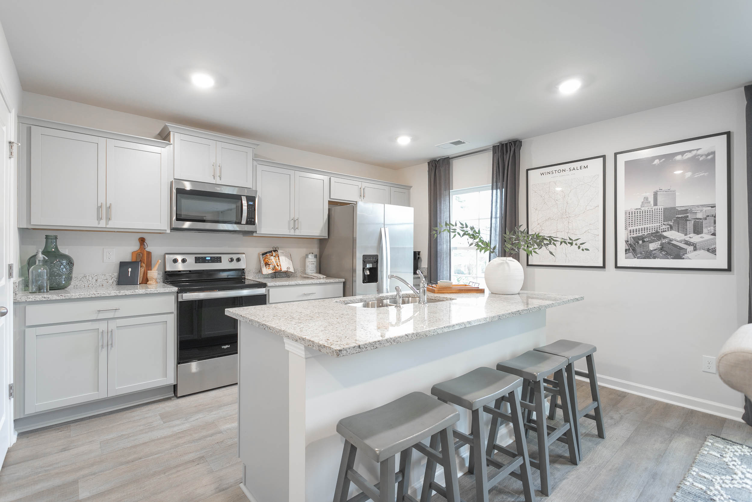 kitchen with island and vinyl floors
