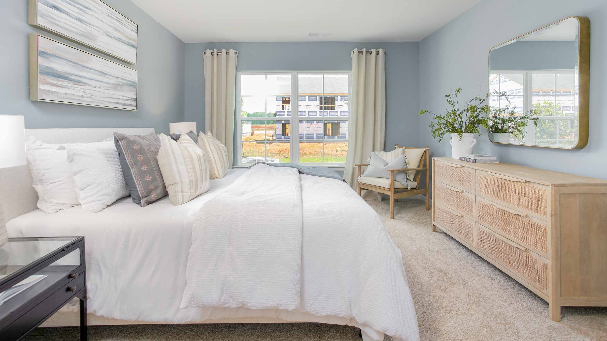 Primary bedroom with windows