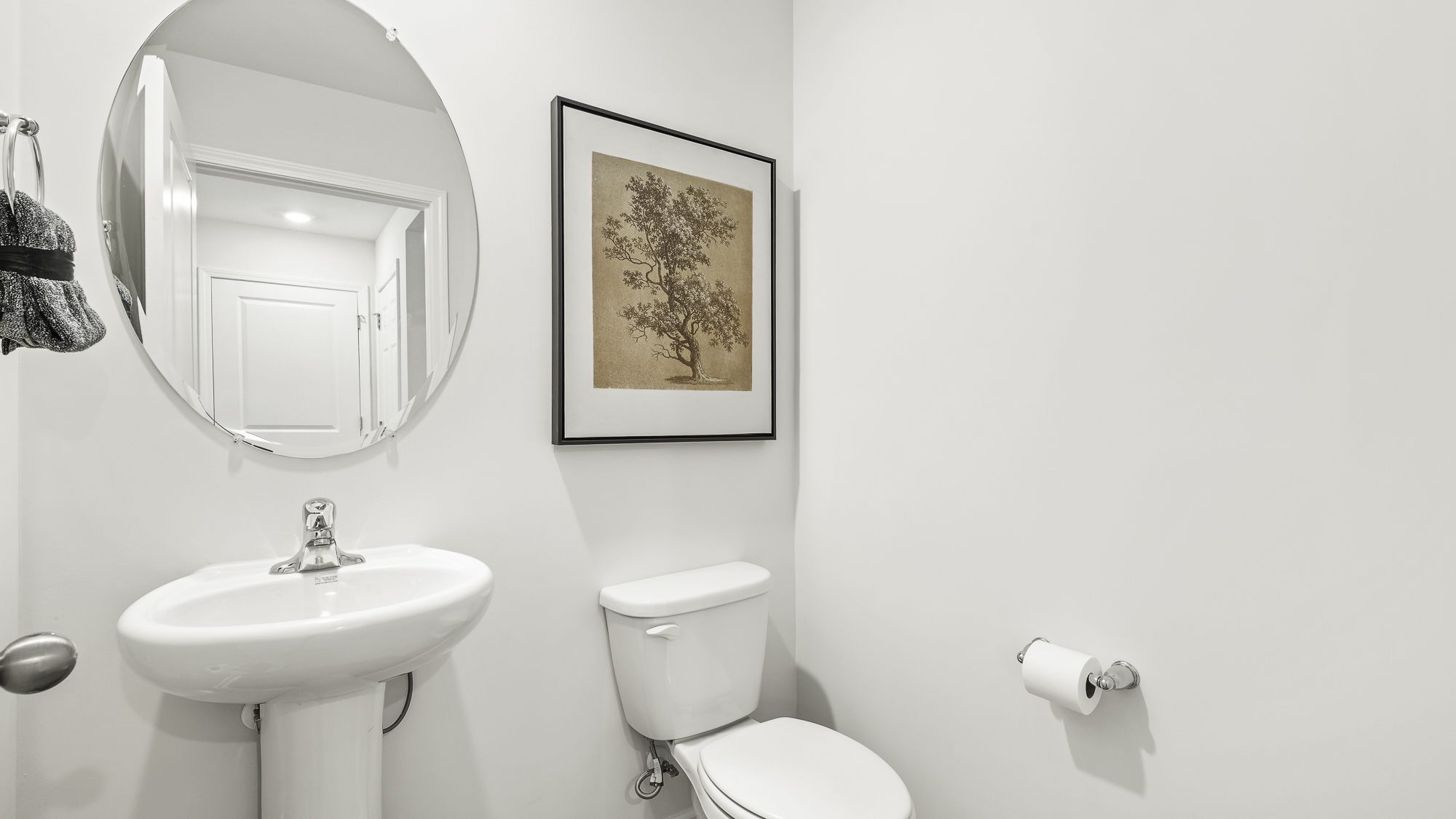 half bathroom off entryway