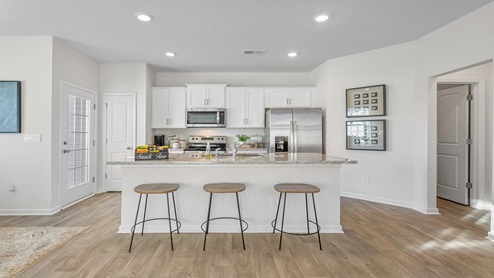 Kitchen with white cabinets