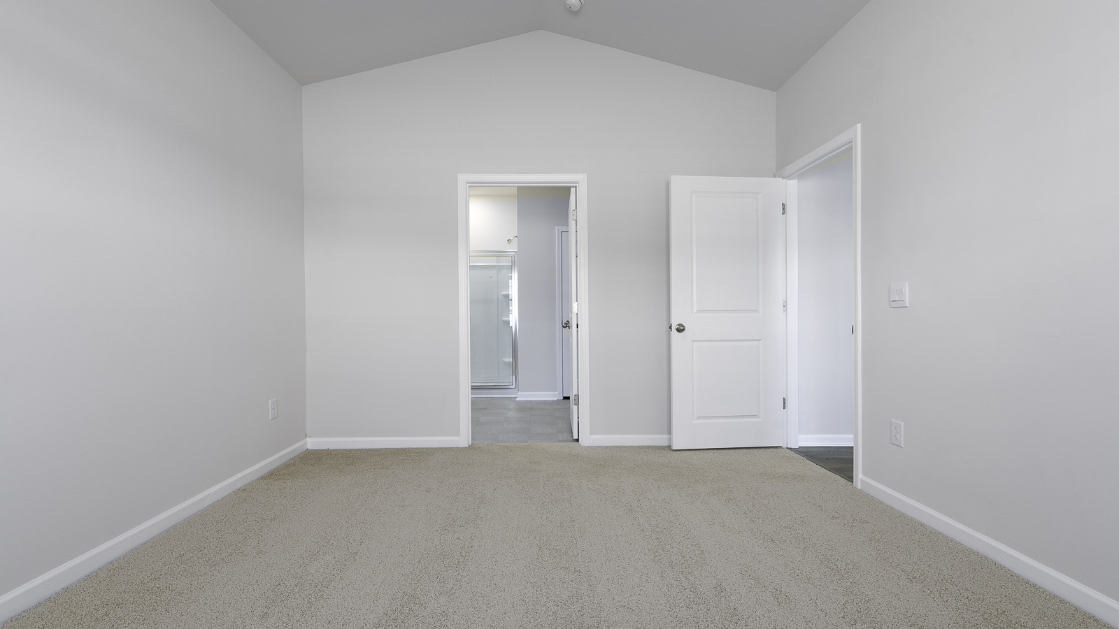 primary bedroom with carpet