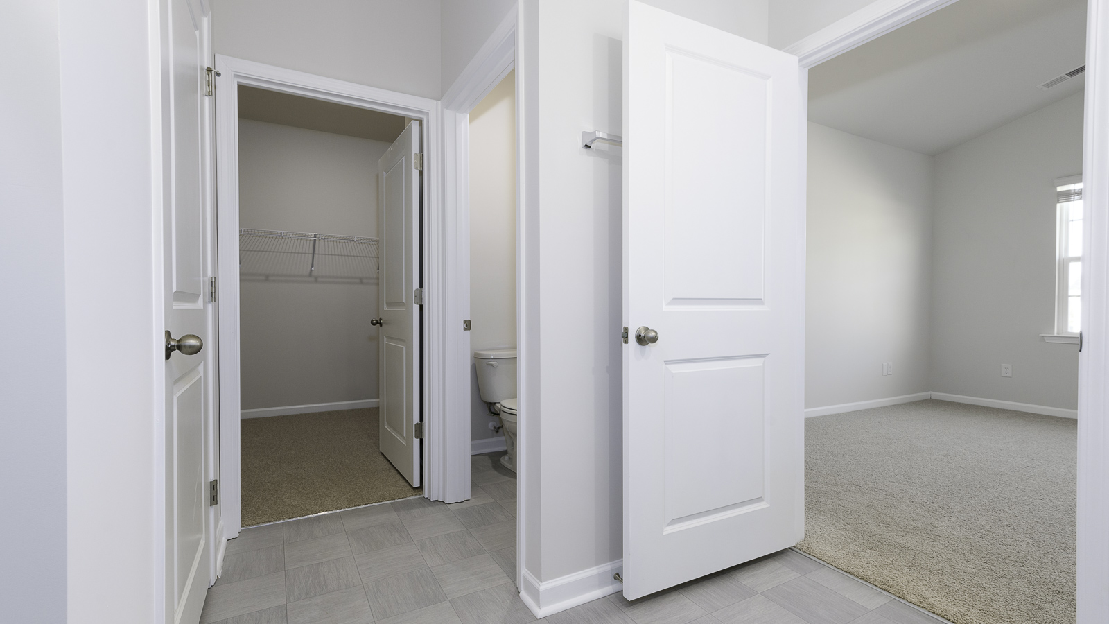 primary bathroom and bedroom entrance