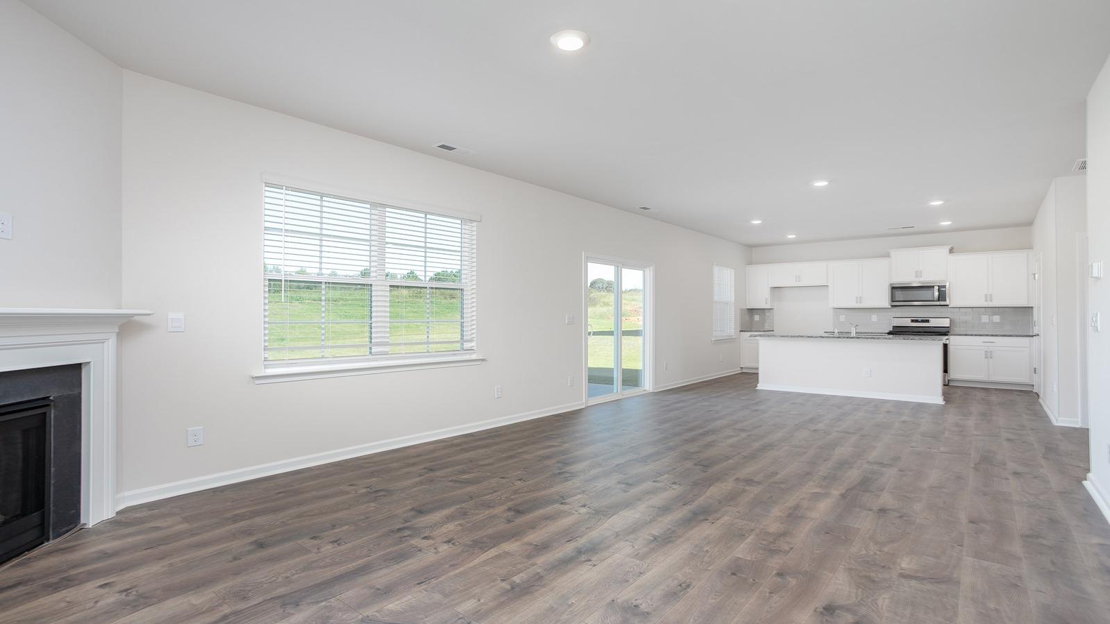 living area and partial kitchen view