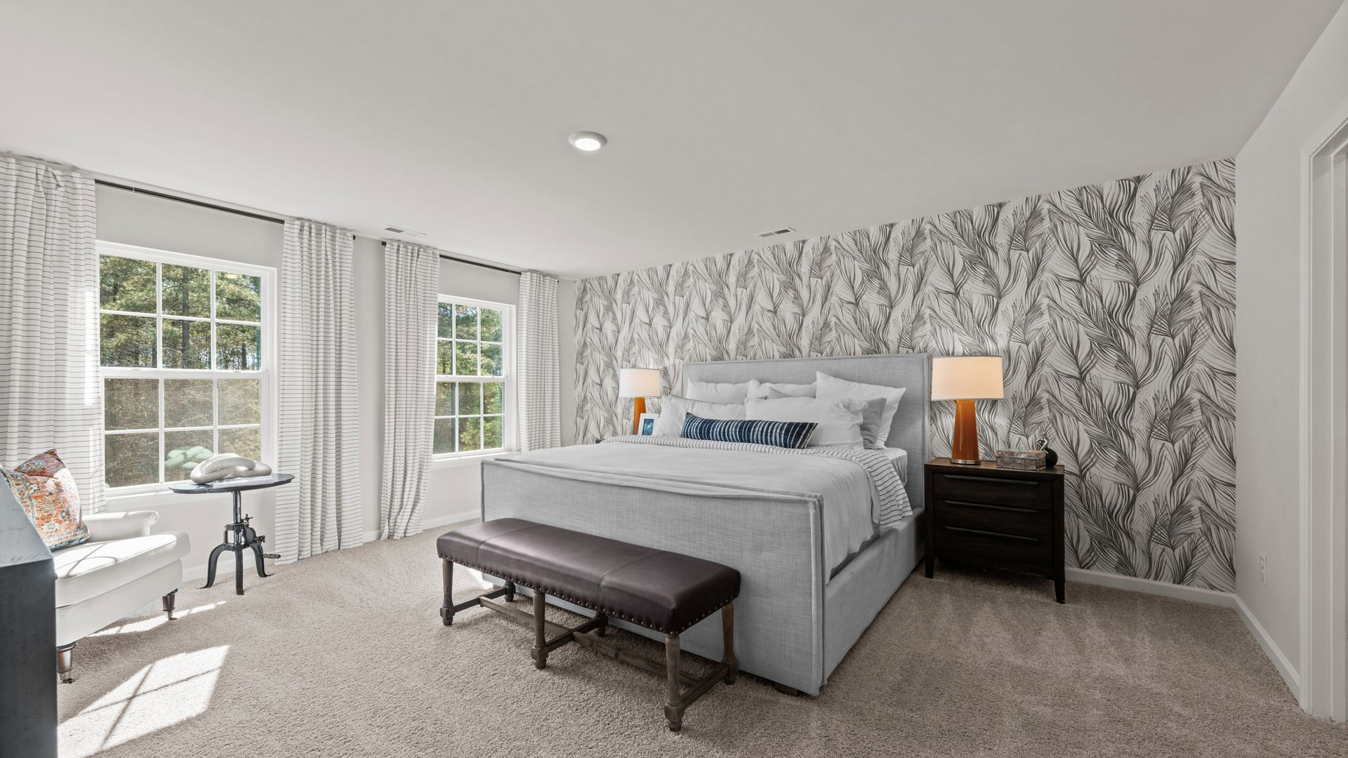 bedroom with carpet and natural light