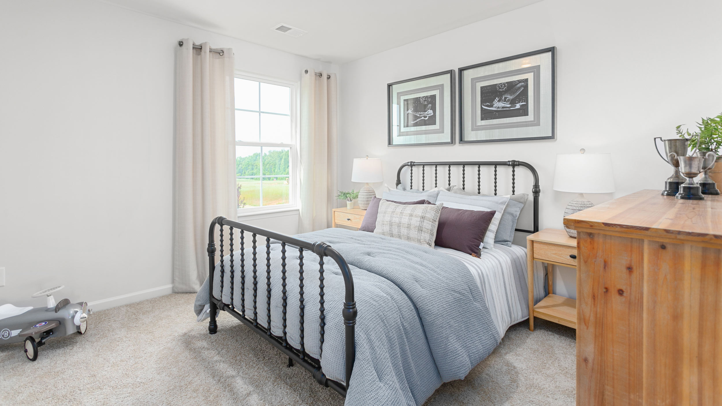 bedroom with carpet and natural light