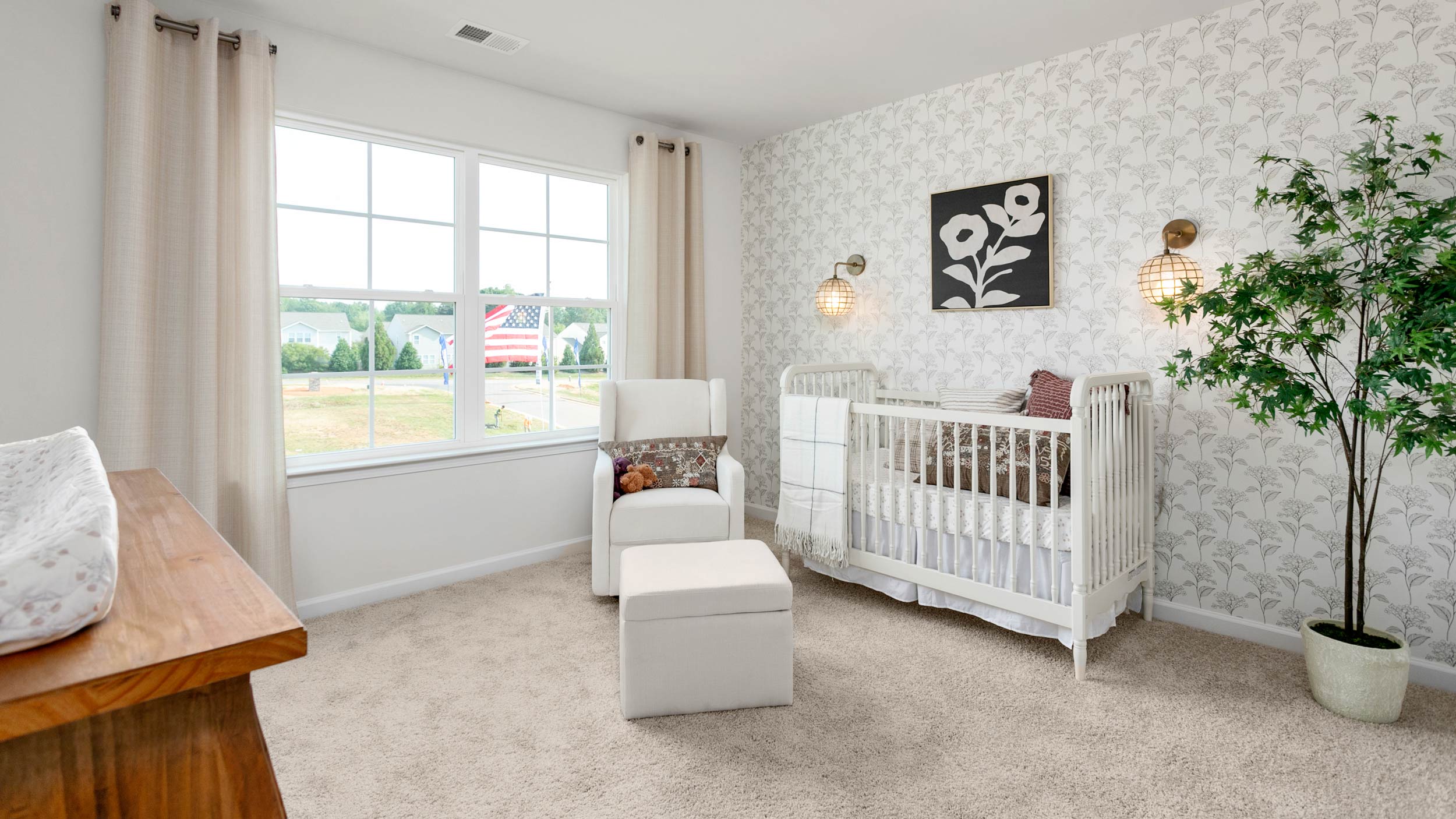 bedroom with carpet and natural light