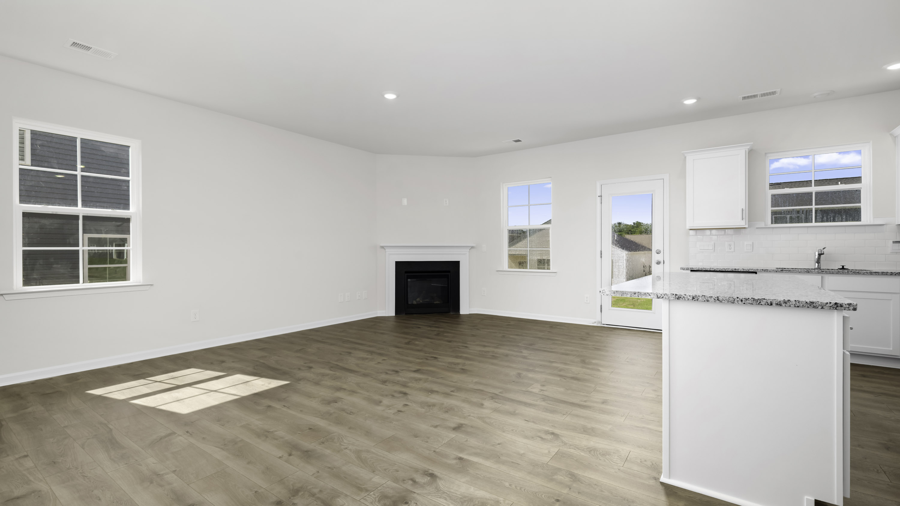living area and kitchen view