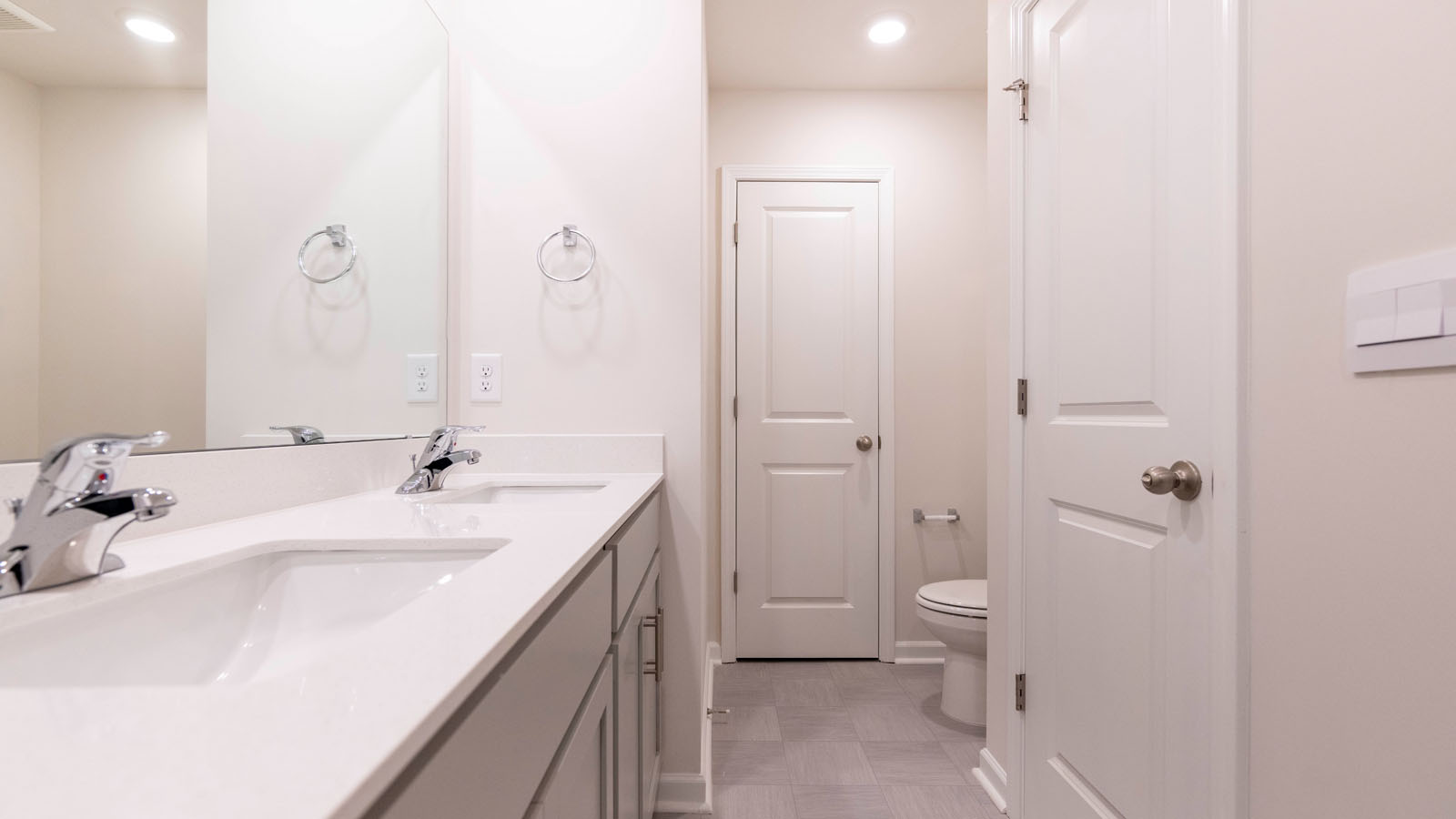 dual sinks secondary bathroom