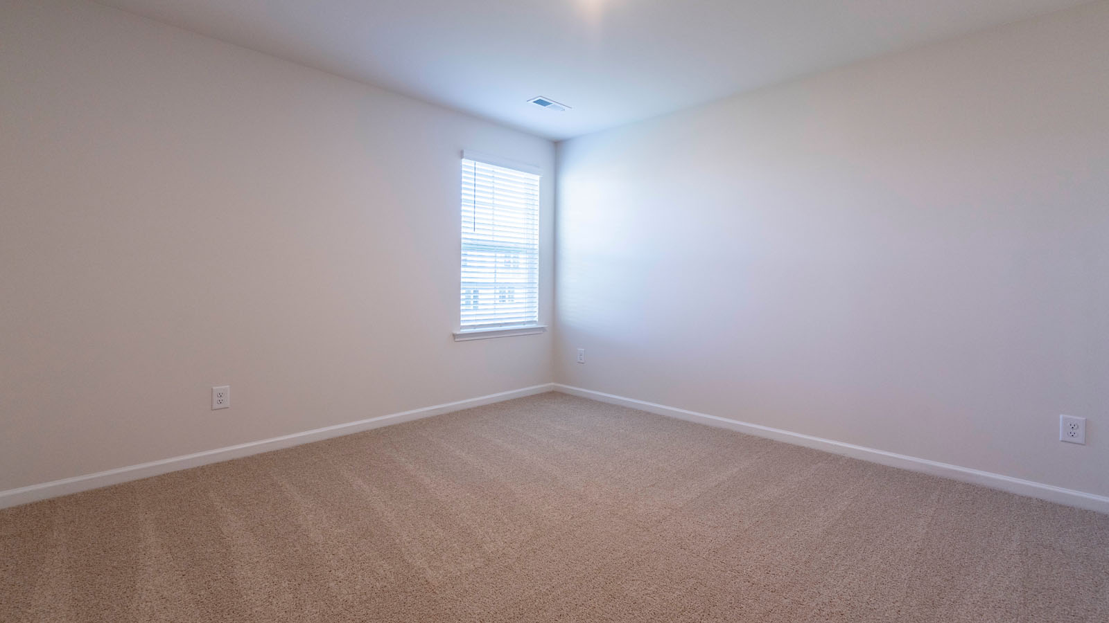secondary bedroom with window