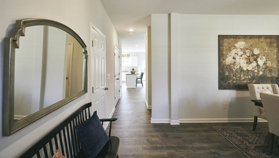 hallway with revwood floor