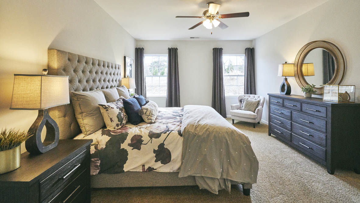 bedroom with carpet and natural light