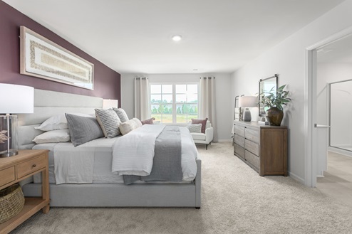 primary bedroom with carpet