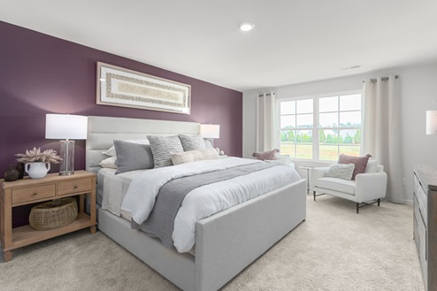 primary bedroom with carpet