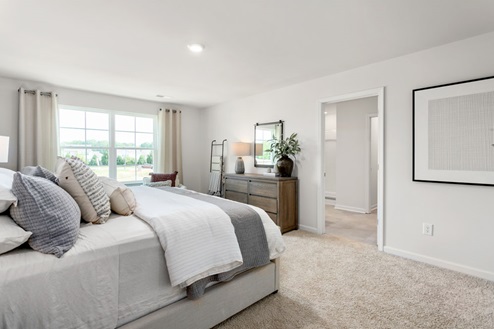 primary bedroom with carpet
