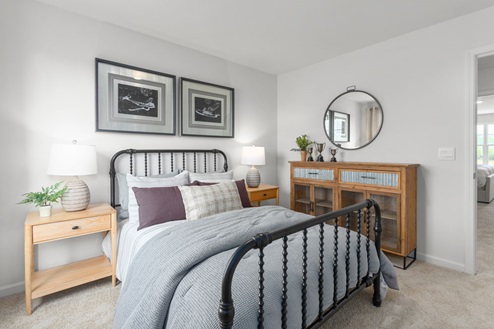 bedroom with carpet and natural light