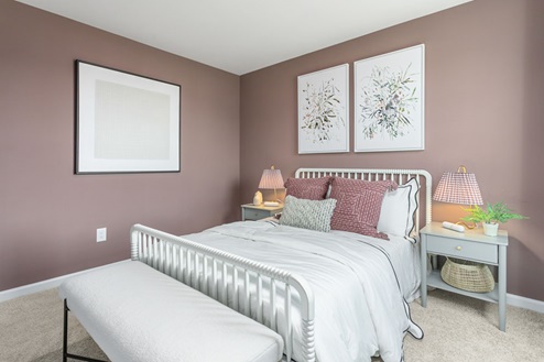 bedroom with carpet and natural light