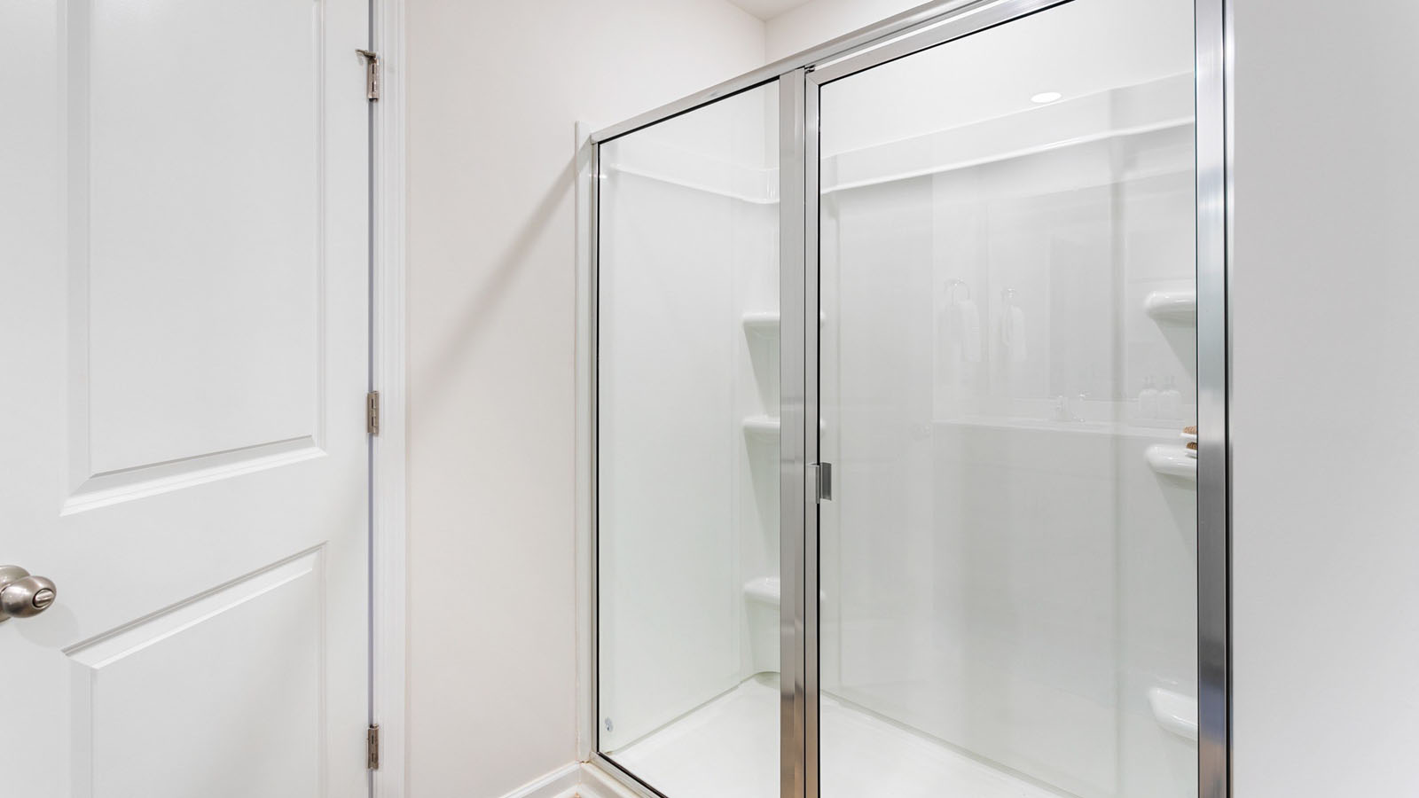 primary bathroom with walk in shower