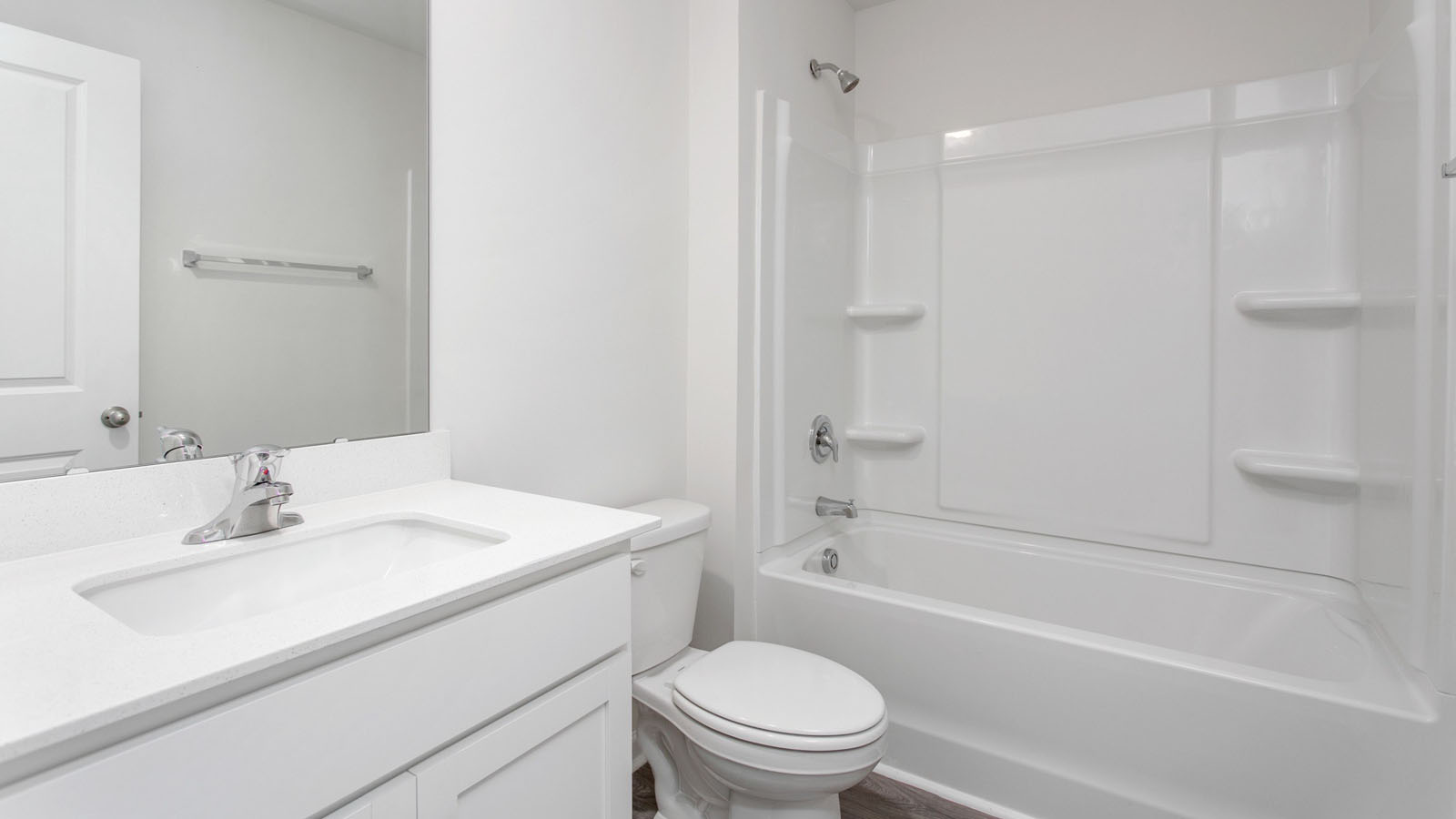 bathroom with tub shower combo
