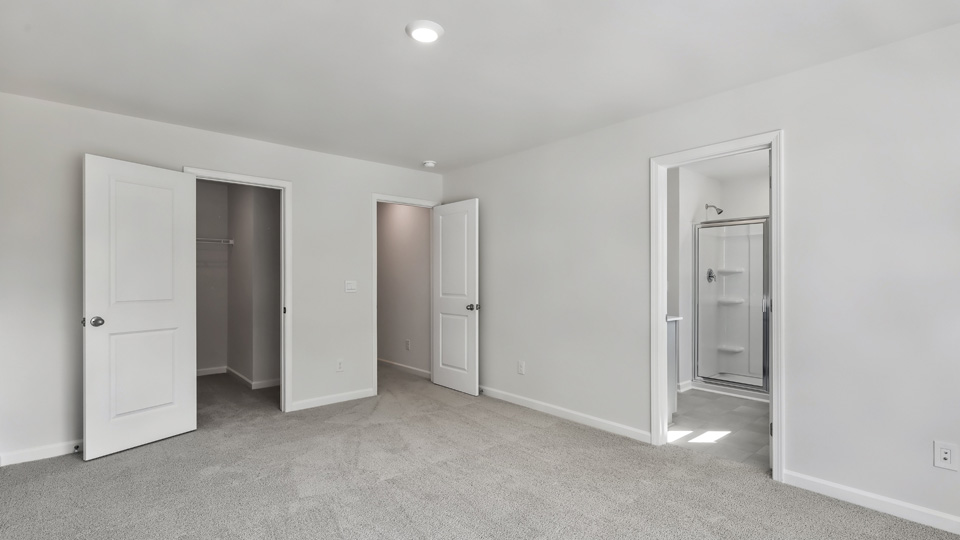 primary bedroom with en suite bathroom