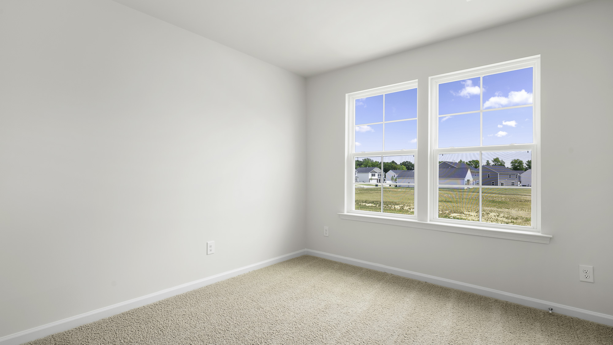 bedroom with 2 windows