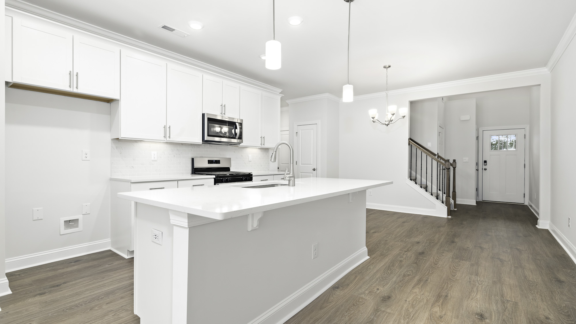 kitchen with a large eat in island