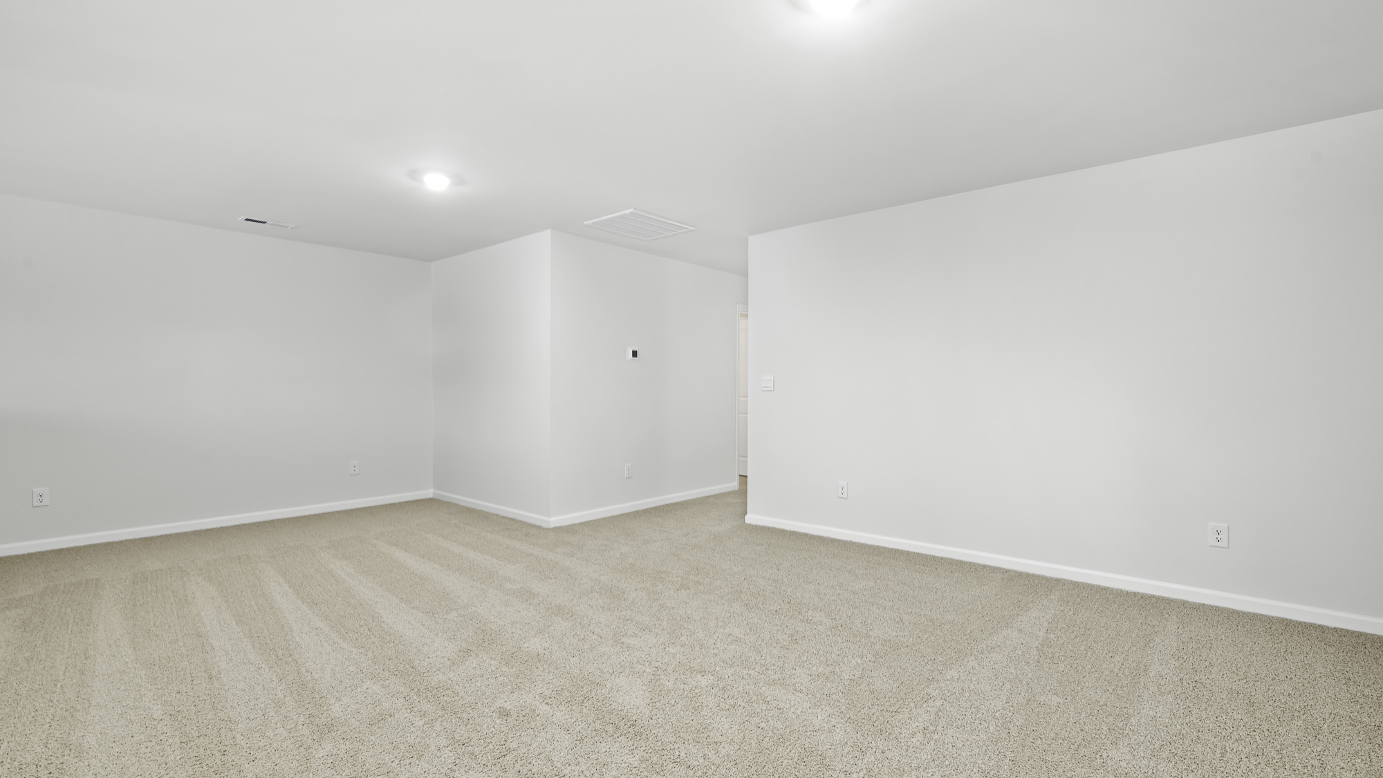 primary bedroom with carpet