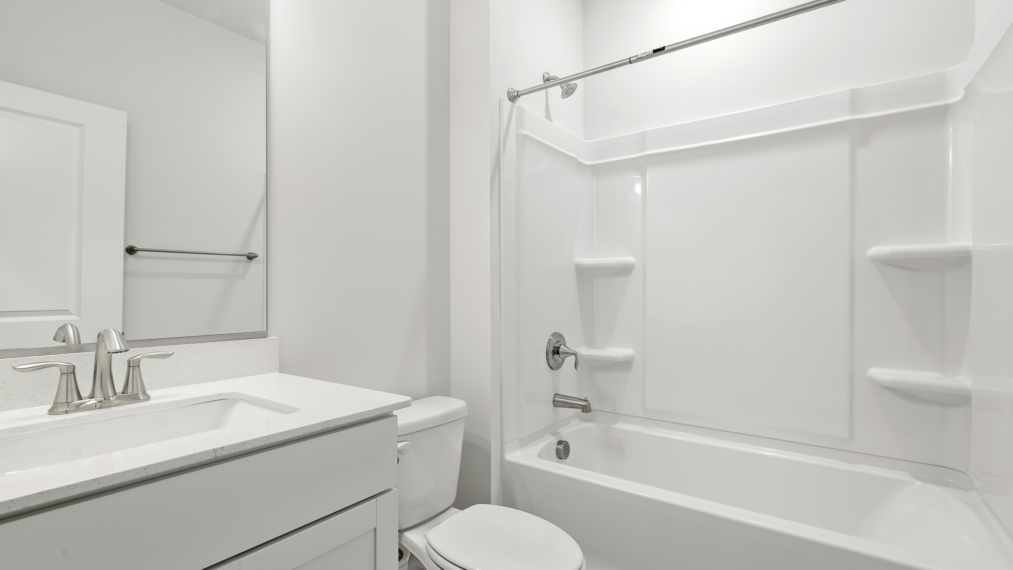 bathroom with tub shower combo