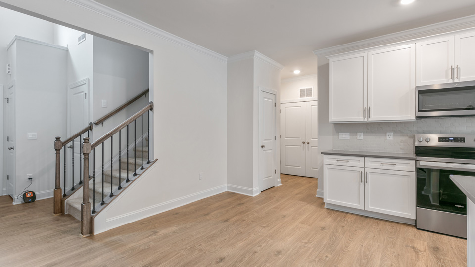 KITCHEN AND STAIRCASE VIEW