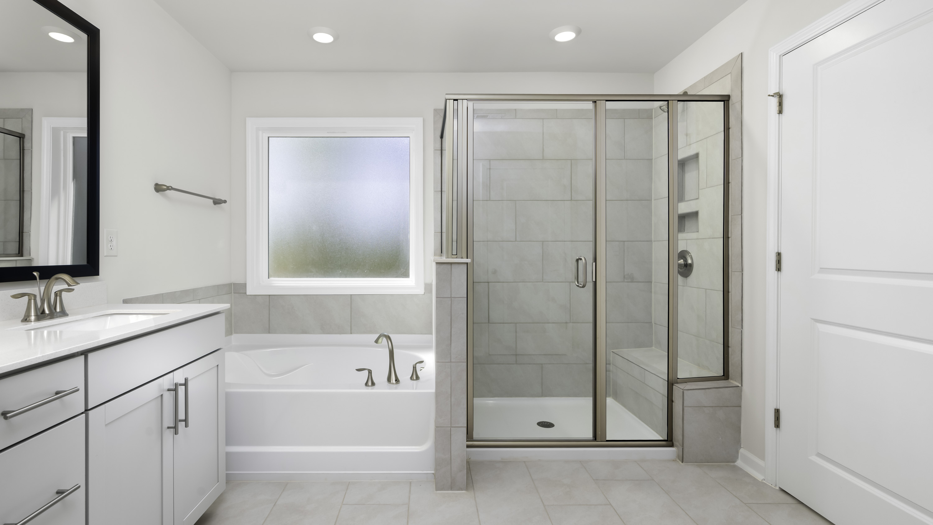 main bathroom with walk-in closet