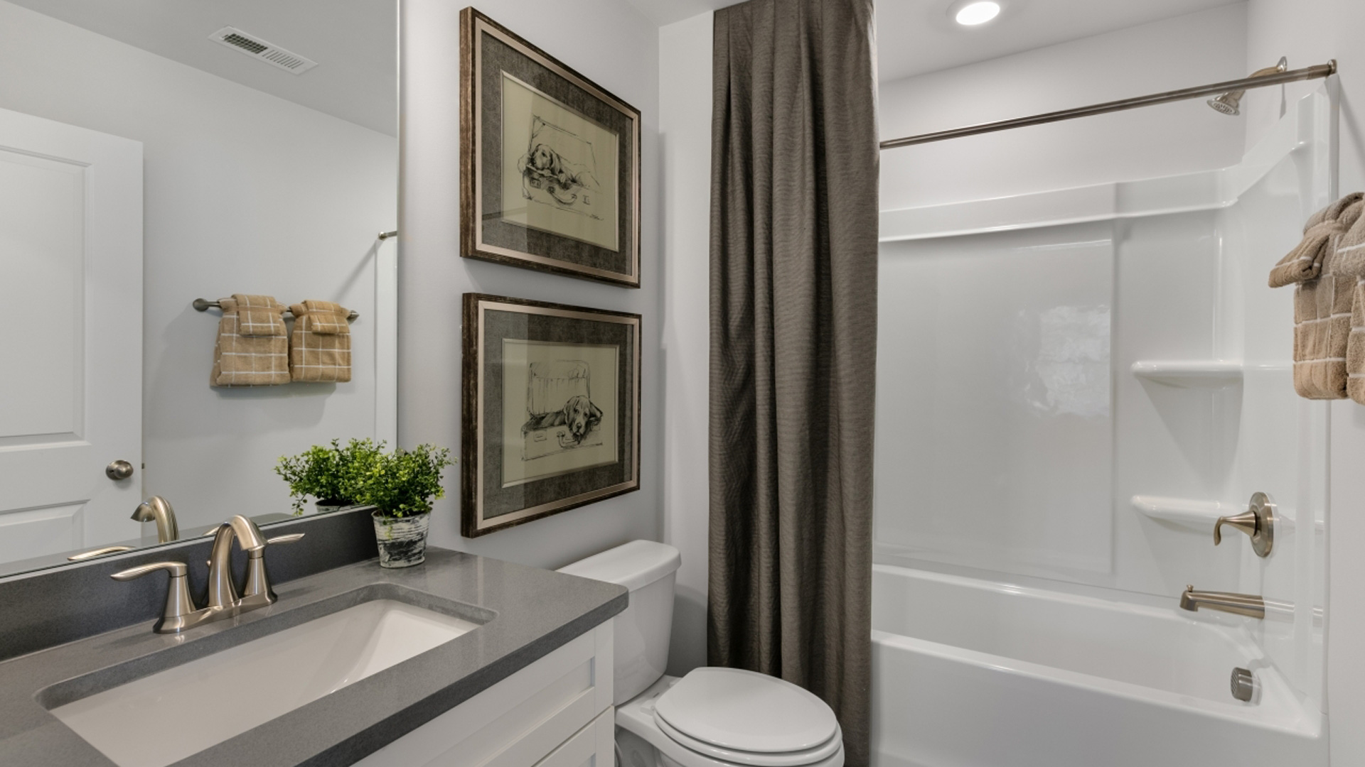 bathroom with tub shower combo