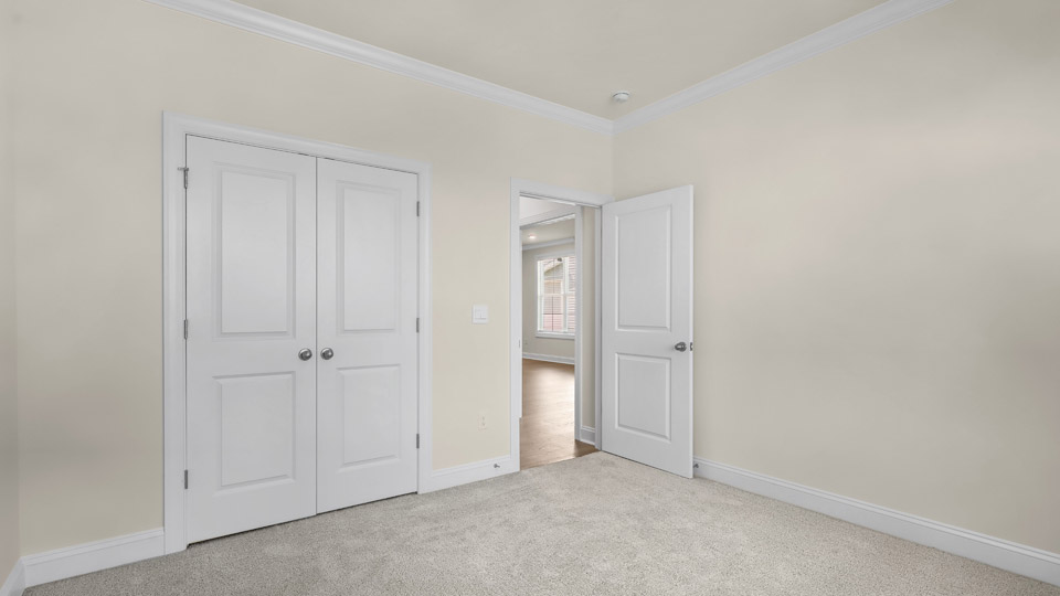 secondary bedroom with closet