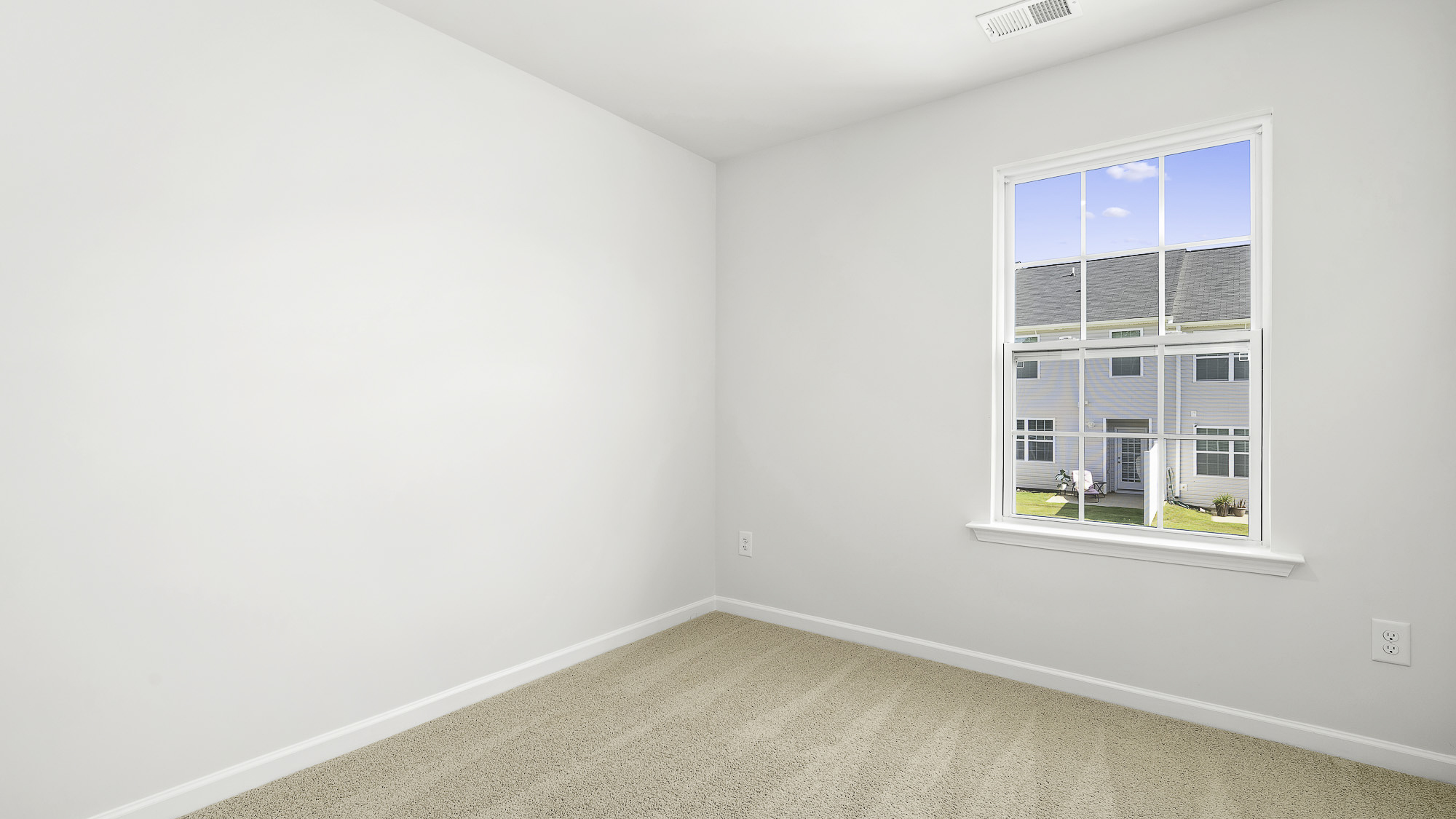 secondary bedroom with carpet